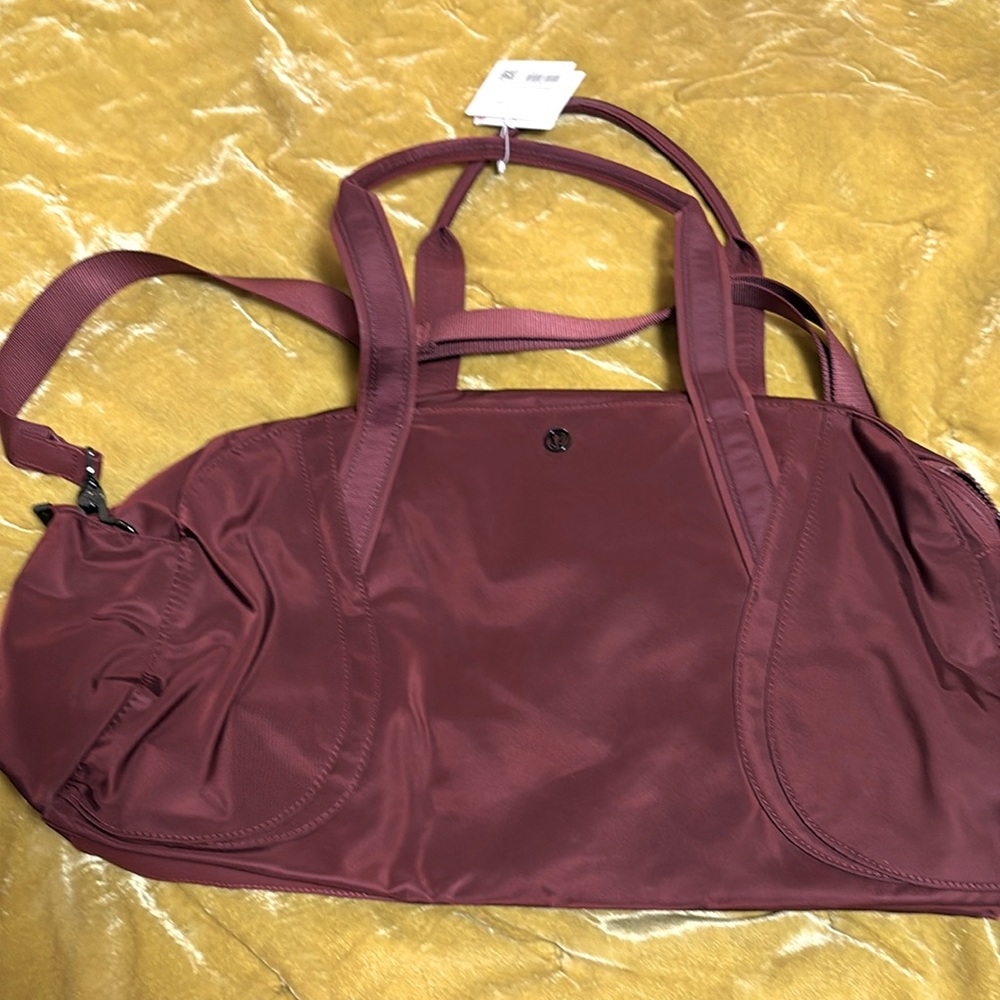 New WITHOUT tags Lululemon Out of Range Duffel bag - 24 wide x 12 high x 8 base